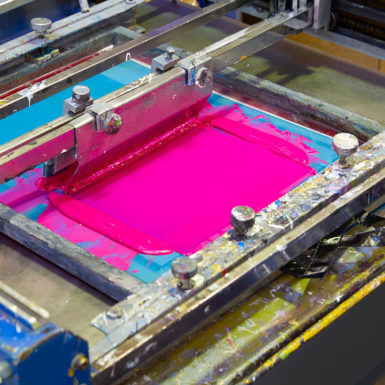 Serigraphy Printer ink machine pink magenta color in printing factory